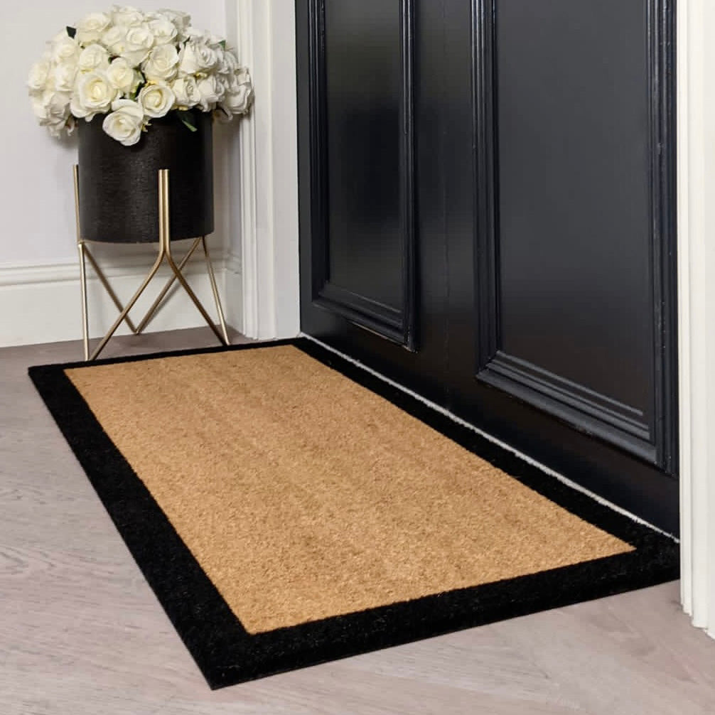 http://rowenhomes.com/cdn/shop/products/kyla-black-border-natural-large-doormat-rug-premier-948857.jpg?v=1659449066