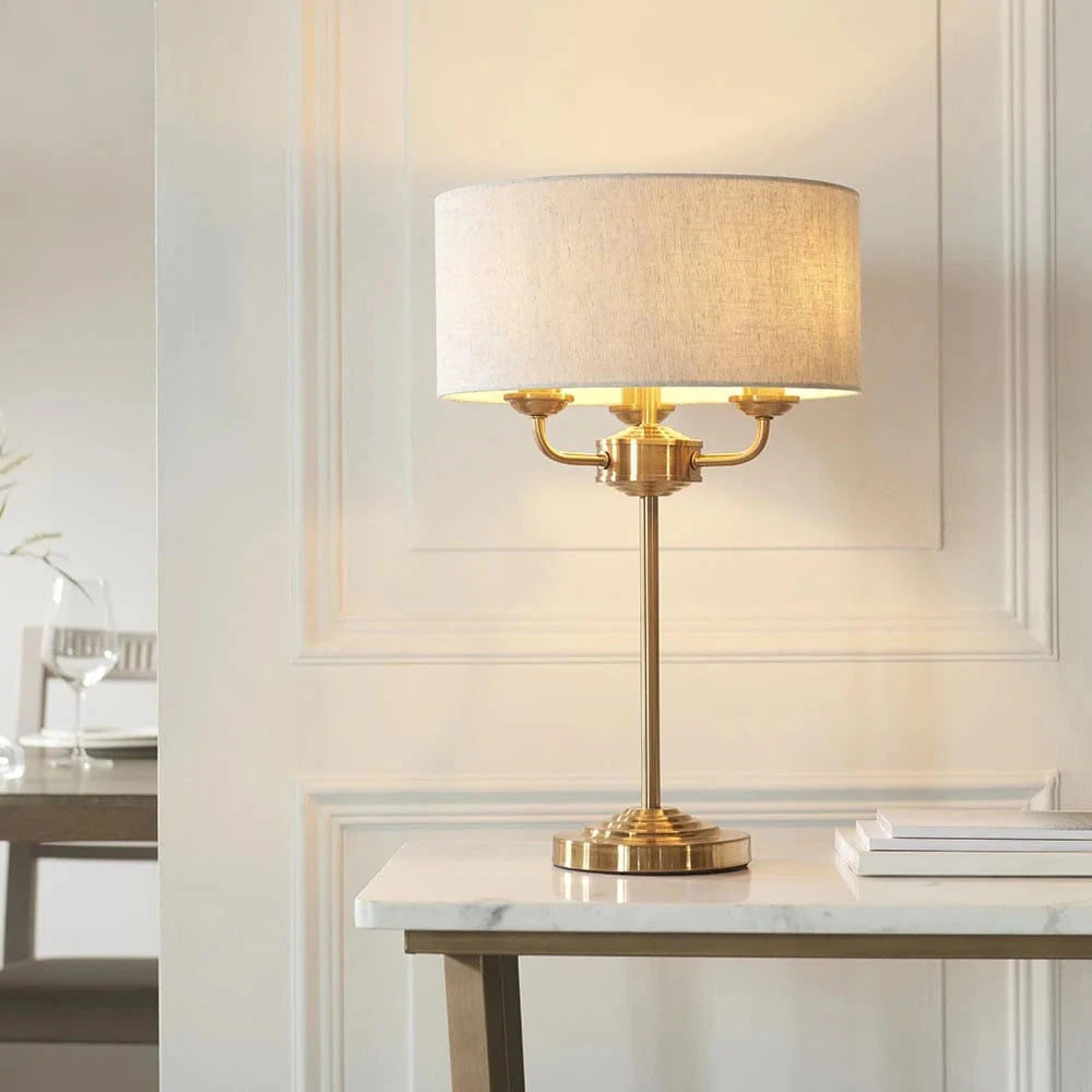 In Stock - Juniper 3 Light Brass Table Lamp with Neutral Shade Lighting 