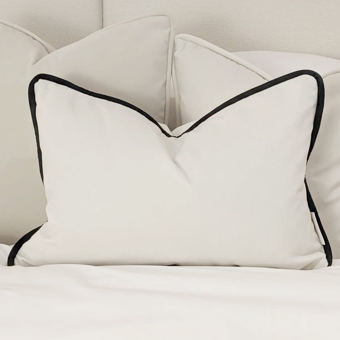 Ari Cream Velvet Bolster Cushion with Black Piping 35x50cm