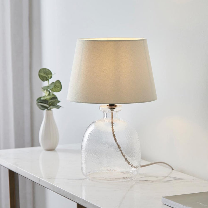 Auden Clear Textured Glass Table Lamp with Ivory Shade Lighting 