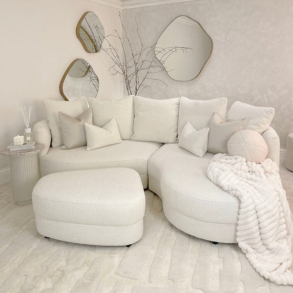 https://rowenhomes.com/cdn/shop/products/ayla-ivory-boucle-pillow-back-curved-chaise-end-sofa-made-to-order-sofa-siren-278249.jpg?v=1691169555&width=600