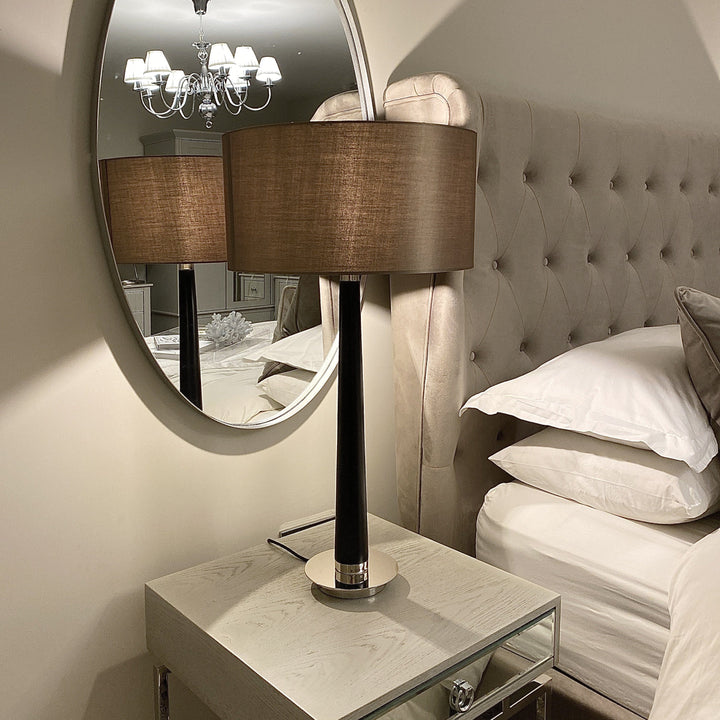 Table lamp with a walnut stand and mink lampshade